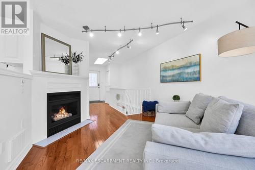 8 - 175 Fiddlers Green Road, Hamilton, ON - Indoor Photo Showing Living Room With Fireplace