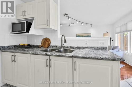 8 - 175 Fiddlers Green Road, Hamilton, ON - Indoor Photo Showing Kitchen With Double Sink With Upgraded Kitchen