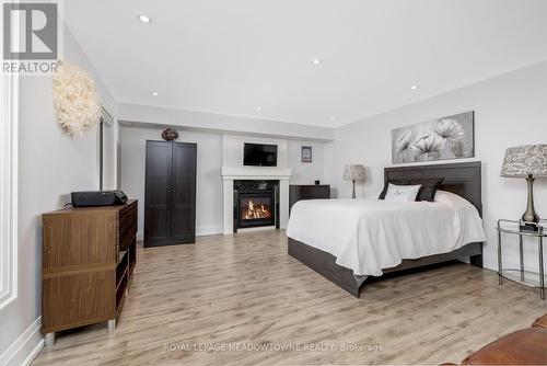 17 Ontario Street, Halton Hills, ON - Indoor Photo Showing Bedroom With Fireplace