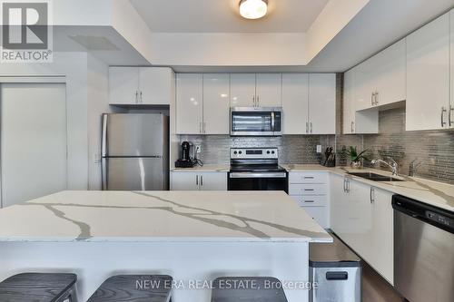 803 - 5279 Highway 7 Road, Vaughan, ON - Indoor Photo Showing Kitchen With Double Sink