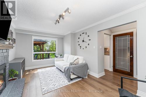 3210 Hazelwood Avenue, Burlington, ON - Indoor Photo Showing Living Room With Fireplace