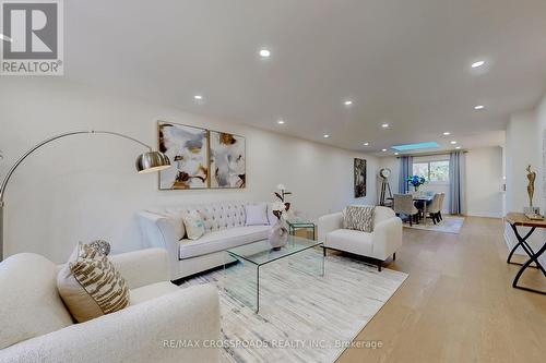 128 Abbeywood Trail, Toronto, ON - Indoor Photo Showing Living Room
