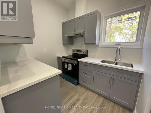 49 Gemshaw Crescent, Toronto, ON - Indoor Photo Showing Kitchen With Double Sink