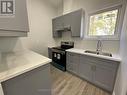 49 Gemshaw Crescent, Toronto, ON  - Indoor Photo Showing Kitchen With Double Sink 