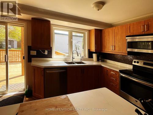 49 Gemshaw Crescent, Toronto, ON - Indoor Photo Showing Kitchen With Double Sink