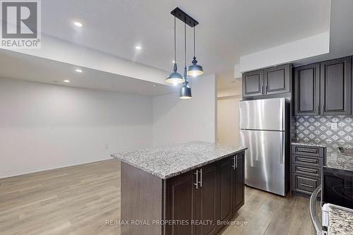 135 - 515 Kingbird Grove, Toronto, ON - Indoor Photo Showing Kitchen With Stainless Steel Kitchen With Upgraded Kitchen