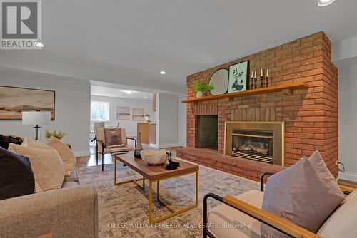 99 Willow Glen Drive, Kawartha Lakes, ON - Indoor Photo Showing Living Room With Fireplace