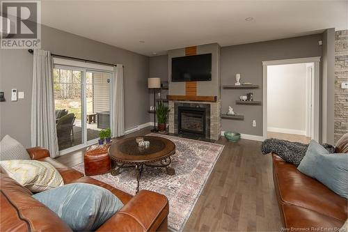 9 Leeland Way, Killarney Road, NB - Indoor Photo Showing Living Room With Fireplace