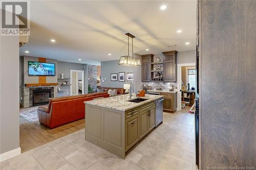 9 Leeland Way, Killarney Road, NB - Indoor Photo Showing Kitchen With Fireplace With Double Sink