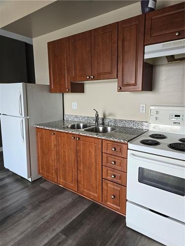 135 James Street S|Unit #1004, Hamilton, ON - Indoor Photo Showing Kitchen With Double Sink