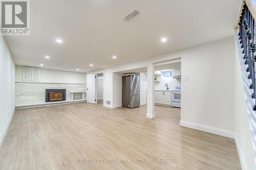 10 Kempsell Crescent, Toronto, ON - Indoor With Fireplace