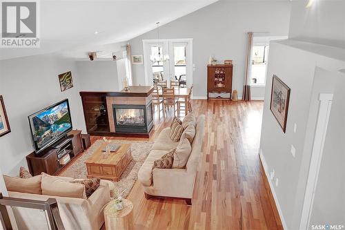 4107 Cumberland Road E, Regina, SK - Indoor Photo Showing Living Room With Fireplace