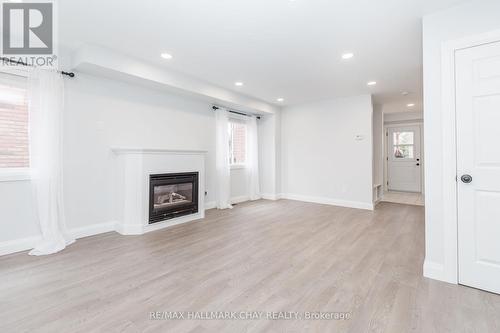 37 Black Cherry Crescent, Barrie, ON - Indoor Photo Showing Living Room With Fireplace