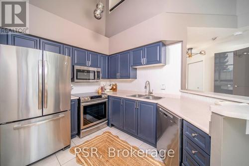 309 - 300 Manitoba Street S, Toronto, ON - Indoor Photo Showing Kitchen With Double Sink