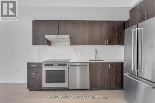317 - 485 Logan Avenue, Toronto, ON - Indoor Photo Showing Kitchen