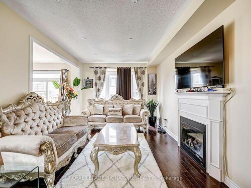 15 Yardmaster Dr, Brampton, ON - Indoor Photo Showing Living Room With Fireplace