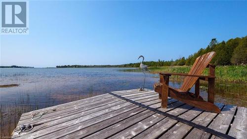 HIGHLIGHT: 267ft. of gradual sandy shoreline in a protected bay! - 49 Widgeon Cove Road, Northern Bruce Peninsula, ON - Outdoor With Body Of Water With View