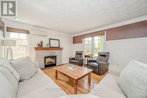 94 First Street N, Hamilton, ON - Indoor Photo Showing Living Room With Fireplace