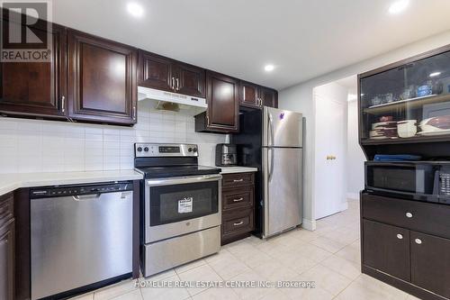 411 - 3700 Kaneff Crescent, Mississauga, ON - Indoor Photo Showing Kitchen With Stainless Steel Kitchen With Upgraded Kitchen