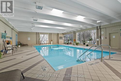 411 - 3700 Kaneff Crescent, Mississauga, ON - Indoor Photo Showing Other Room With In Ground Pool
