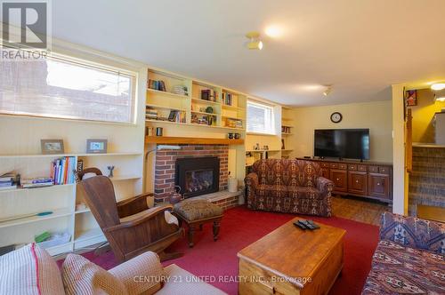 1166 Huron Street, Peterborough, ON - Indoor Photo Showing Living Room With Fireplace