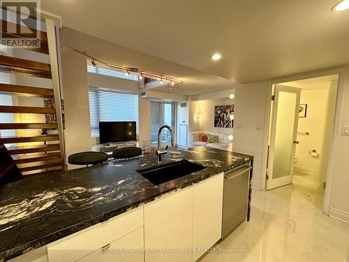 705 - 80 Cumberland Street, Toronto, ON - Indoor Photo Showing Kitchen With Double Sink