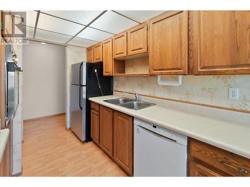 2085 Gordon Drive Unit# 320, Kelowna, BC - Indoor Photo Showing Kitchen With Double Sink