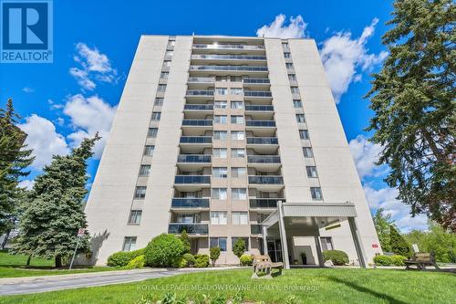 802 - 81 Millside Drive, Milton, ON - Outdoor With Balcony With Facade