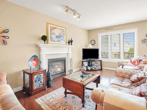 16 Riesling St, Grimsby, ON - Indoor Photo Showing Living Room With Fireplace