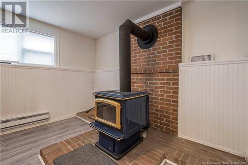 17 Country Crescent, Quispamsis, NB - Indoor Photo Showing Other Room With Fireplace