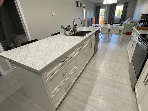61 Boschman Bay, Brandon, MB - Indoor Photo Showing Kitchen With Double Sink