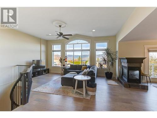 291 Sandpiper Court, Kelowna, BC - Indoor Photo Showing Living Room With Fireplace
