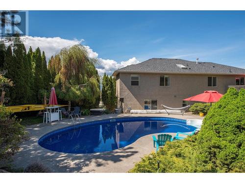 291 Sandpiper Court, Kelowna, BC - Outdoor With In Ground Pool With Backyard