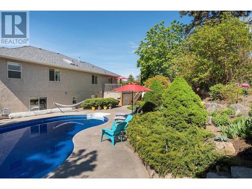 291 Sandpiper Court, Kelowna, BC - Outdoor With In Ground Pool