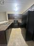103 - 1471 Maple Avenue, Milton, ON  - Indoor Photo Showing Kitchen With Double Sink 