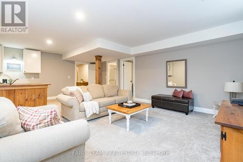 1402 Flos Road 8 E, Springwater, ON - Indoor Photo Showing Living Room