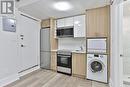 18 - 915 St Clair Avenue W, Toronto, ON  - Indoor Photo Showing Laundry Room 