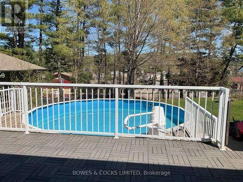 34 Chemaushgon Road, Bancroft, ON - Outdoor With Above Ground Pool