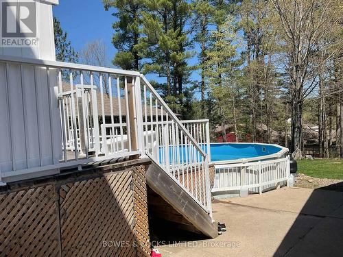 34 Chemaushgon Road, Bancroft, ON - Outdoor With Above Ground Pool