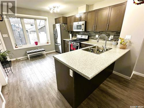 4657 E Primrose Green Drive, Regina, SK - Indoor Photo Showing Kitchen With Double Sink