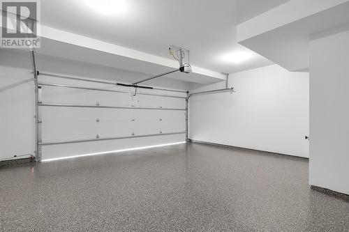 1455 Cara Glen Court Unit# 108, Kelowna, BC - Indoor Photo Showing Garage