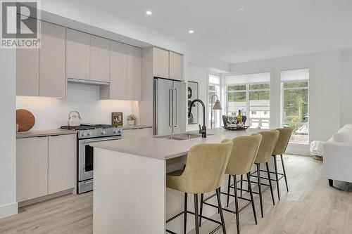 1455 Cara Glen Court Unit# 108, Kelowna, BC - Indoor Photo Showing Kitchen With Stainless Steel Kitchen With Double Sink With Upgraded Kitchen