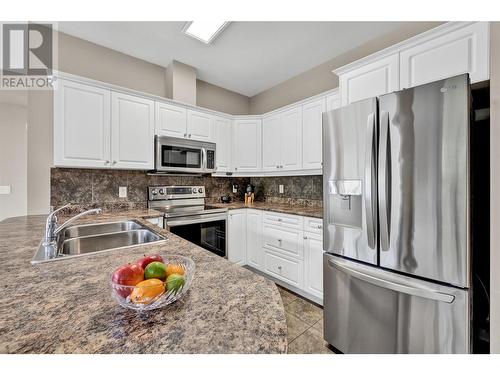 3550 Woodsdale Road Unit# 219, Lake Country, BC - Indoor Photo Showing Kitchen With Double Sink With Upgraded Kitchen