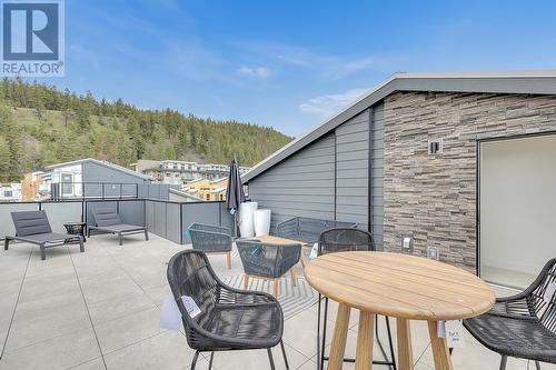 Roof Top Patio - Photo of a similar home in the community. - 1455 Cara Glen Court Unit# 103, Kelowna, BC - Outdoor With Deck Patio Veranda With Exterior