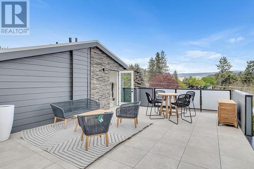 Roof Top Patio - Photo of a similar home in the community. - 1455 Cara Glen Court Unit# 103, Kelowna, BC - Outdoor With Deck Patio Veranda With Exterior