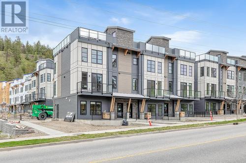 Front Exterior - Photo of a similar home in the community. - 1455 Cara Glen Court Unit# 103, Kelowna, BC - Outdoor With Facade