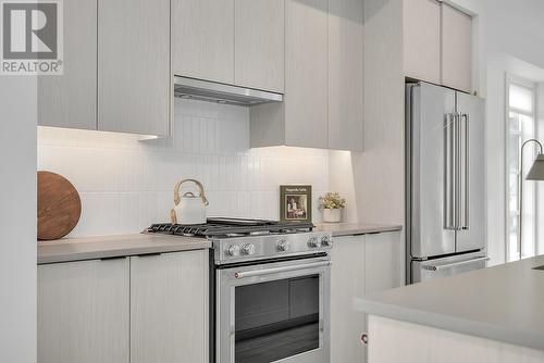 Kitchen - Photo of a similar home in the community. - 1455 Cara Glen Court Unit# 103, Kelowna, BC - Indoor Photo Showing Kitchen With Upgraded Kitchen