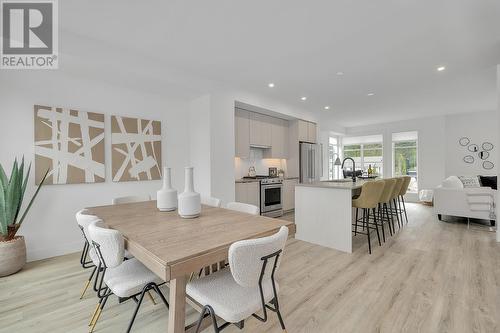 Dining Room - Photo of a similar home in the community. - 1455 Cara Glen Court Unit# 103, Kelowna, BC - Indoor Photo Showing Other Room