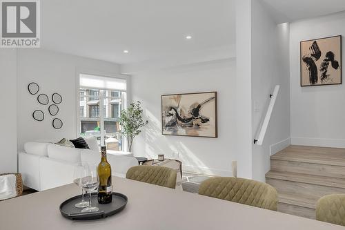 Photo of a similar home in the community. - 1455 Cara Glen Court Unit# 103, Kelowna, BC - Indoor Photo Showing Dining Room