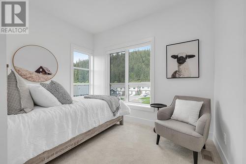 Bedroom - Photo of a similar home in the community. - 1455 Cara Glen Court Unit# 103, Kelowna, BC - Indoor Photo Showing Bedroom